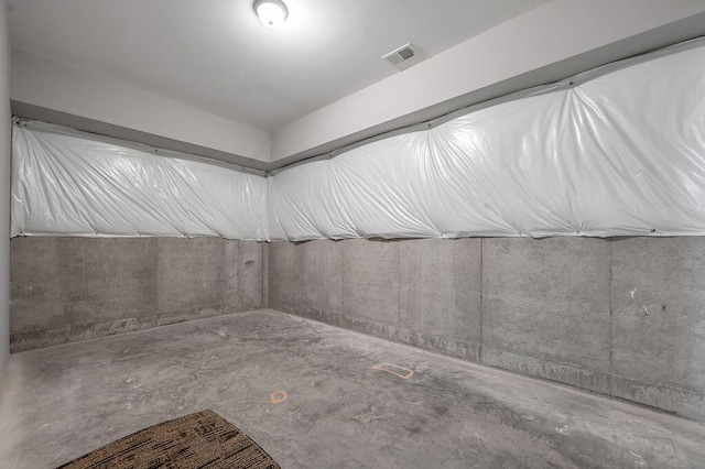 bathroom with concrete flooring