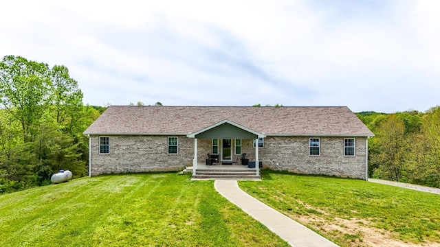 663 John R Jones Rd, London, KY 40741 - ranch-style home featuring a front lawn, brick siding, and a porch