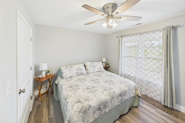 663 John R Jones Rd, London, KY 40741 - bedroom with wood finished floors, baseboards, and a ceiling fan