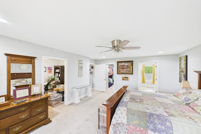 663 John R Jones Rd, London, KY 40741 - bedroom featuring light colored carpet, a walk in closet, a ceiling fan, a closet, and ensuite bath