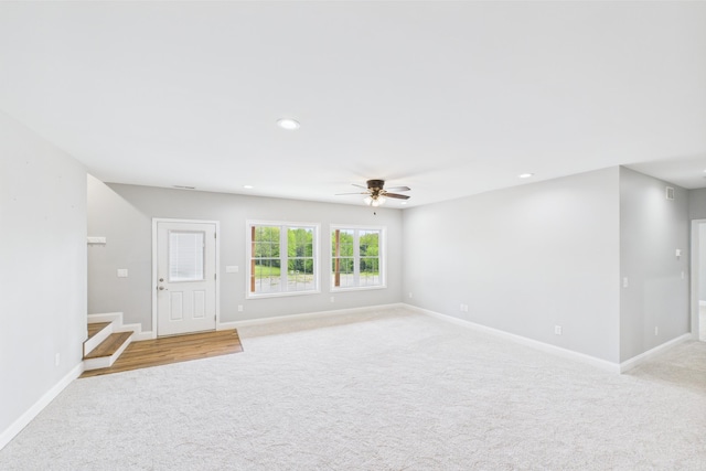 663 John R Jones Rd, London, KY 40741 - unfurnished living room with light carpet, ceiling fan, baseboards, and recessed lighting