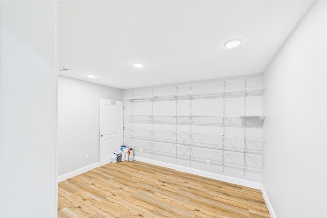 663 John R Jones Rd, London, KY 40741 - empty room featuring light wood finished floors, baseboards, and recessed lighting