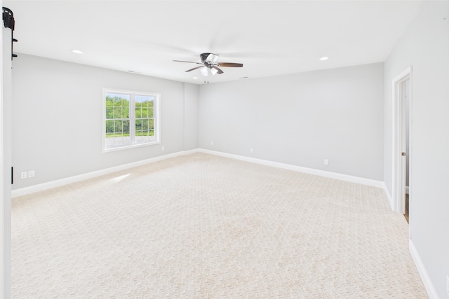 663 John R Jones Rd, London, KY 40741 - unfurnished room with a ceiling fan, recessed lighting, light colored carpet, and baseboards