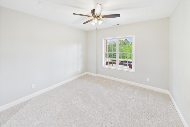 663 John R Jones Rd, London, KY 40741 - spare room with light colored carpet, ceiling fan, and baseboards