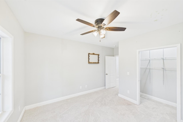 663 John R Jones Rd, London, KY 40741 - unfurnished bedroom featuring light carpet, a closet, baseboards, and a ceiling fan