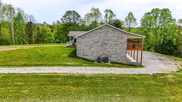 663 John R Jones Rd, London, KY 40741 - view of home's exterior featuring a lawn and a wooden deck