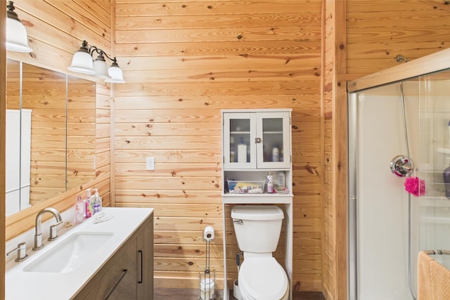 663 John R Jones Rd, London, KY 40741 - bathroom featuring wooden walls, a shower stall, toilet, and vanity