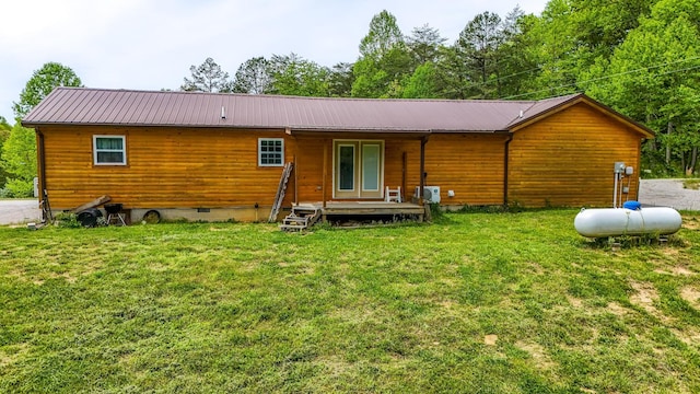 663 John R Jones Rd, London, KY 40741 - back of property featuring a yard, crawl space, and metal roof