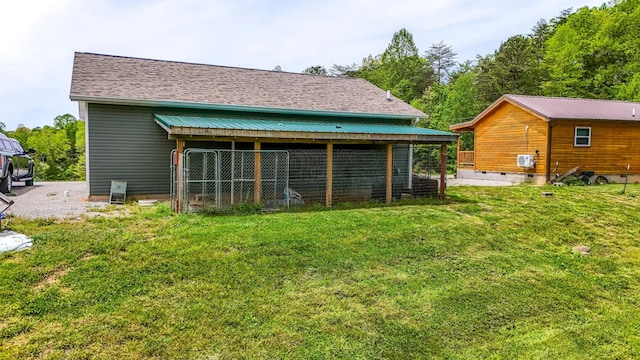 663 John R Jones Rd, London, KY 40741 - rear view of house with an outbuilding and a yard