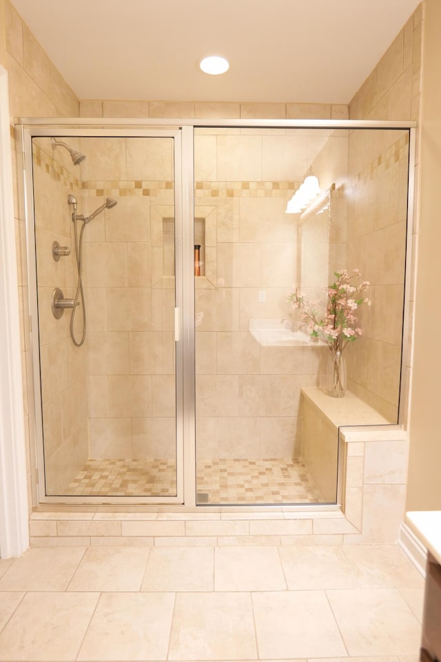 full bathroom featuring a stall shower and recessed lighting