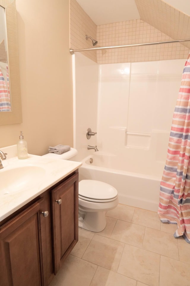 full bathroom with toilet, shower / bathtub combination with curtain, vanity, and tile patterned flooring