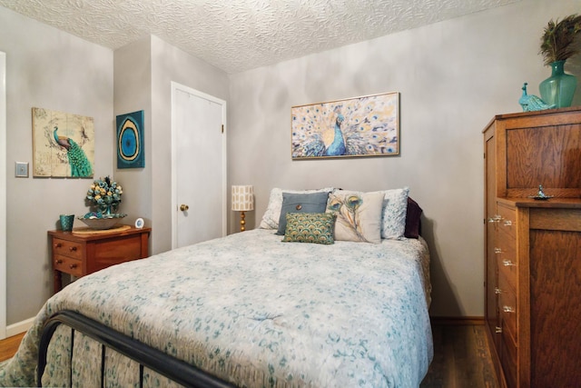 429 Old Danville Rd, Lancaster, KY 40444 - bedroom with dark wood finished floors, baseboards, and a textured ceiling