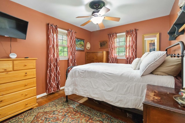 429 Old Danville Rd, Lancaster, KY 40444 - bedroom featuring multiple windows, wood finished floors, ceiling fan, and baseboards