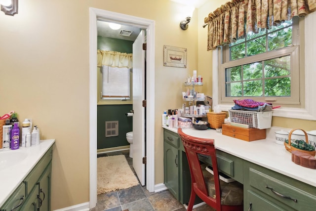 429 Old Danville Rd, Lancaster, KY 40444 - bathroom with toilet, baseboards, vanity, and stone finish floors