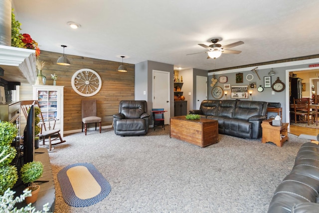 429 Old Danville Rd, Lancaster, KY 40444 - living area with wooden walls, ceiling fan, and carpet floors