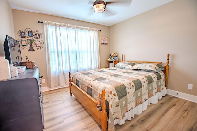 63 Liam Way, Paint Lick, KY 40461 - bedroom featuring light wood-type flooring, baseboards, and a ceiling fan