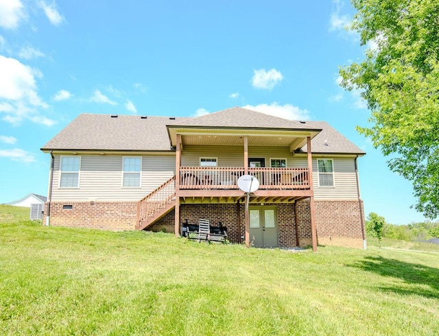 63 Liam Way, Paint Lick, KY 40461 - back of property with a wooden deck, a lawn, brick siding, and stairway