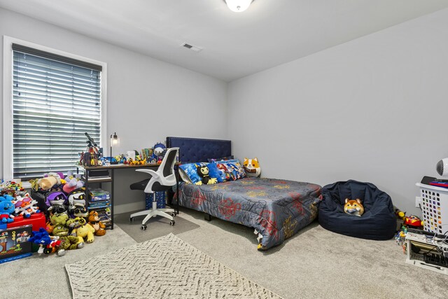 bedroom featuring carpet flooring