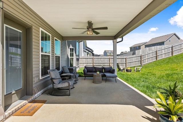 view of patio / terrace with an outdoor hangout area and a ceiling fan