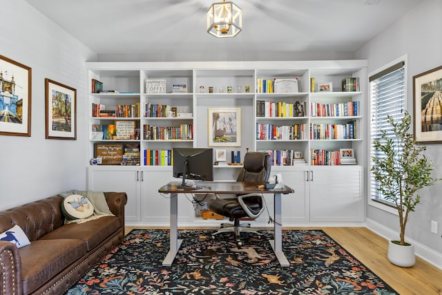 office area featuring wood finished floors and healthy amount of natural light