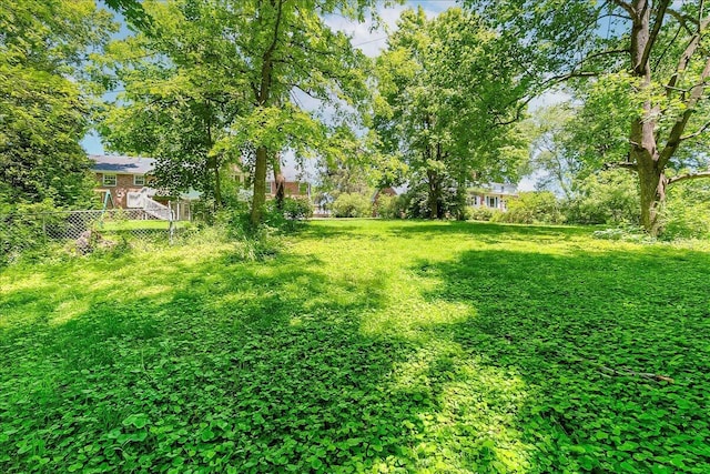 view of yard with fence