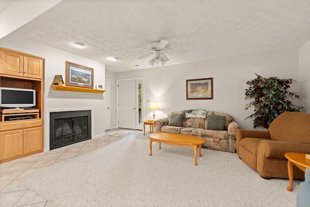 18-2 Woodson Bend Resort, Bronston, KY 42518 - living area featuring a textured ceiling, light tile patterned floors, a fireplace, and ceiling fan