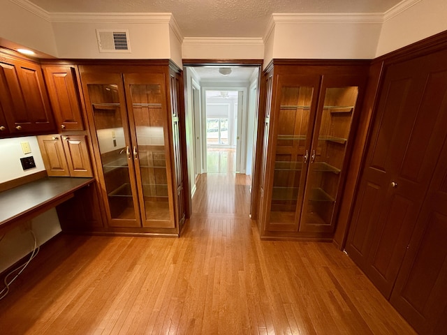 118 Timber Ln, Morehead, KY 40351 - hallway featuring light wood-style flooring, an office area, and ornamental molding