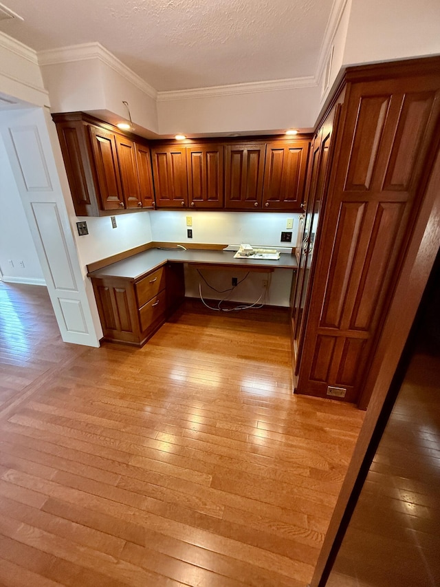 118 Timber Ln, Morehead, KY 40351 - kitchen with light wood finished floors, light countertops, and crown molding