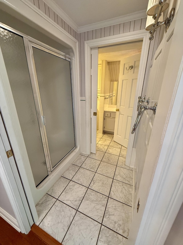 118 Timber Ln, Morehead, KY 40351 - bathroom with a shower stall, marble look tiles, ornamental molding, and vanity