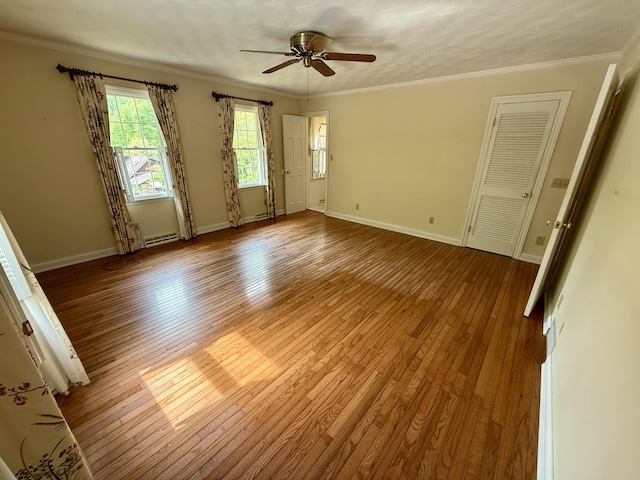 118 Timber Ln, Morehead, KY 40351 - empty room with wood-type flooring, ceiling fan, baseboards, and ornamental molding