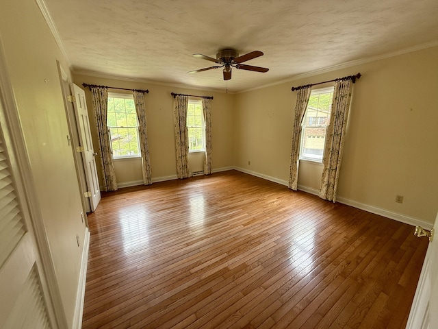 118 Timber Ln, Morehead, KY 40351 - empty room featuring a ceiling fan, wood-type flooring, baseboards, and ornamental molding