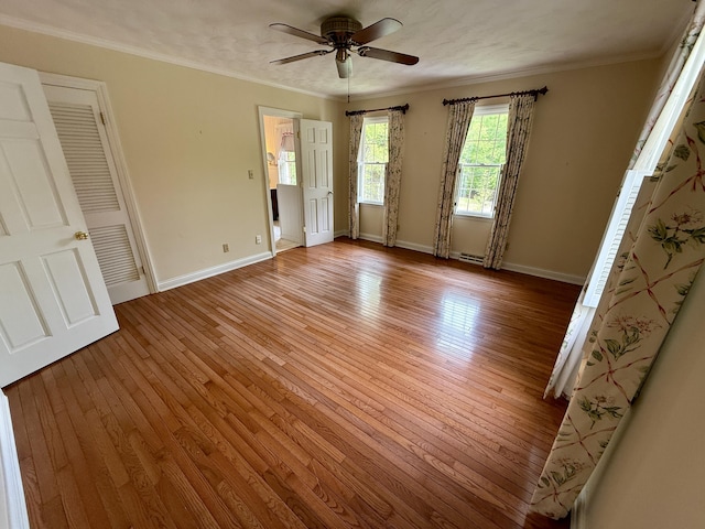 118 Timber Ln, Morehead, KY 40351 - empty room featuring ceiling fan, light wood-style floors, baseboards, and crown molding