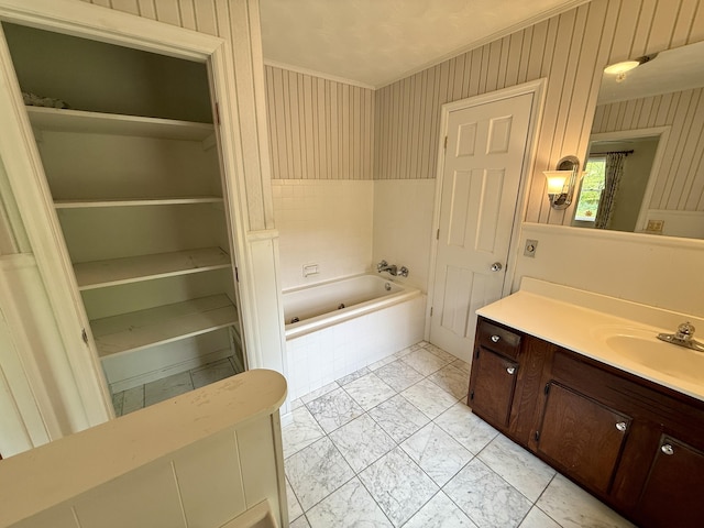 118 Timber Ln, Morehead, KY 40351 - full bath with marble look tile flooring, a tub with jets, vanity, and crown molding