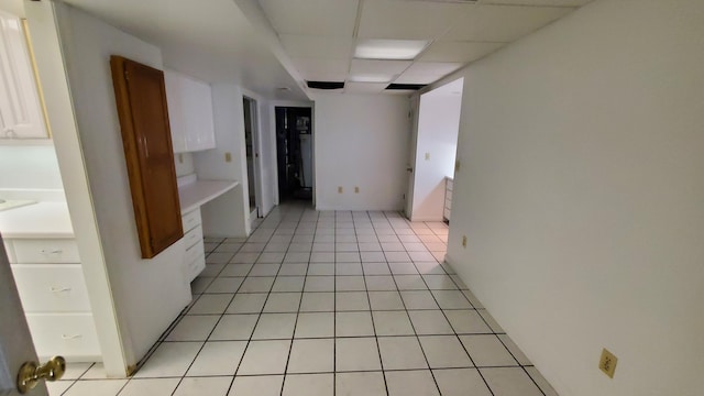 118 Timber Ln, Morehead, KY 40351 - kitchen featuring white cabinetry, light tile patterned floors, and a drop ceiling