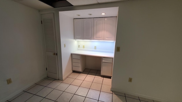 118 Timber Ln, Morehead, KY 40351 - kitchen with white cabinets, light tile patterned floors, baseboards, and light countertops