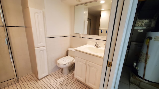 118 Timber Ln, Morehead, KY 40351 - bathroom with water heater, vanity, toilet, tile patterned flooring, and tile walls