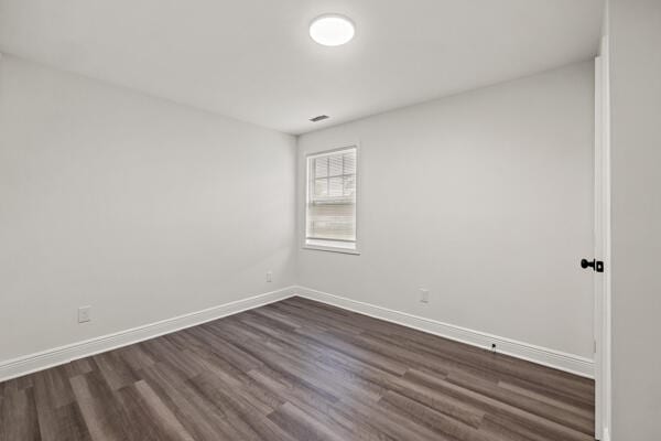 426 Cardwell Ave, Harrodsburg, KY 40330 - spare room with dark wood-type flooring and baseboards