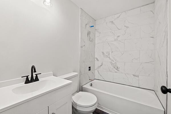 426 Cardwell Ave, Harrodsburg, KY 40330 - bathroom featuring toilet, vanity, and washtub / shower combination