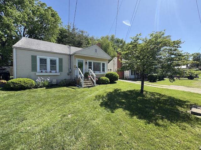 view of front of home featuring a front yard