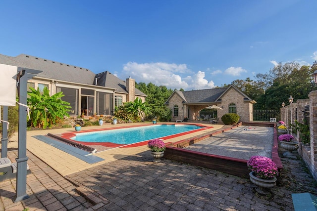150 Old Woods Dr, Nicholasville, KY 40356 - view of pool with a sunroom, a patio area, and fence