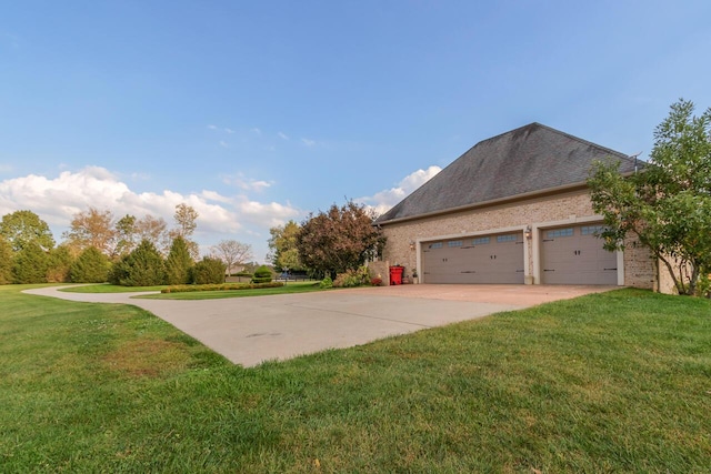 150 Old Woods Dr, Nicholasville, KY 40356 - view of property exterior featuring a lawn, concrete driveway, brick siding, and a garage