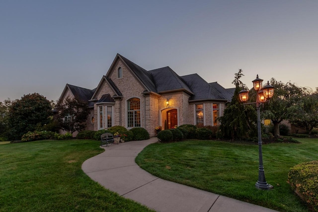 150 Old Woods Dr, Nicholasville, KY 40356 - french country inspired facade featuring a lawn and brick siding
