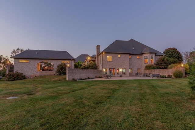 150 Old Woods Dr, Nicholasville, KY 40356 - rear view of house with a patio area, a chimney, and a yard