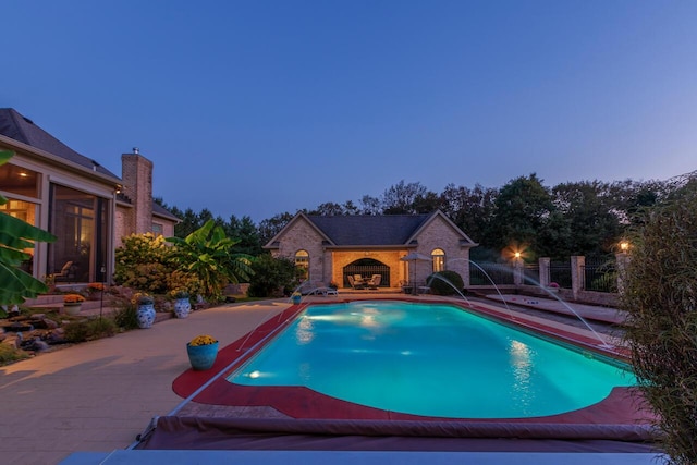 150 Old Woods Dr, Nicholasville, KY 40356 - pool at dusk with a patio area