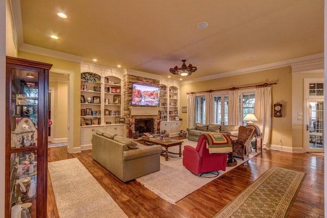 150 Old Woods Dr, Nicholasville, KY 40356 - living area featuring ornamental molding, baseboards, a fireplace, wood finished floors, and built in features