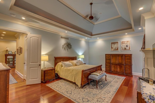 150 Old Woods Dr, Nicholasville, KY 40356 - bedroom with a tray ceiling, dark wood-type flooring, crown molding, and baseboards