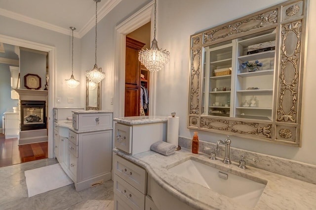 150 Old Woods Dr, Nicholasville, KY 40356 - bathroom with ornamental molding, a chandelier, vanity, a spacious closet, and a multi sided fireplace