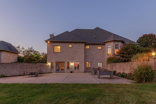 150 Old Woods Dr, Nicholasville, KY 40356 - rear view of house with a chimney, a patio, and brick siding