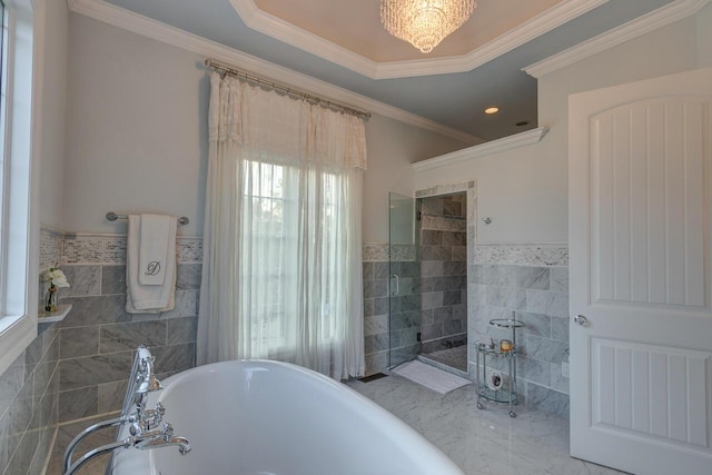 150 Old Woods Dr, Nicholasville, KY 40356 - full bathroom with tile walls, a freestanding tub, a wainscoted wall, ornamental molding, and a tile shower