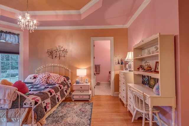 150 Old Woods Dr, Nicholasville, KY 40356 - bedroom featuring light wood-style floors, a chandelier, ornamental molding, and a raised ceiling